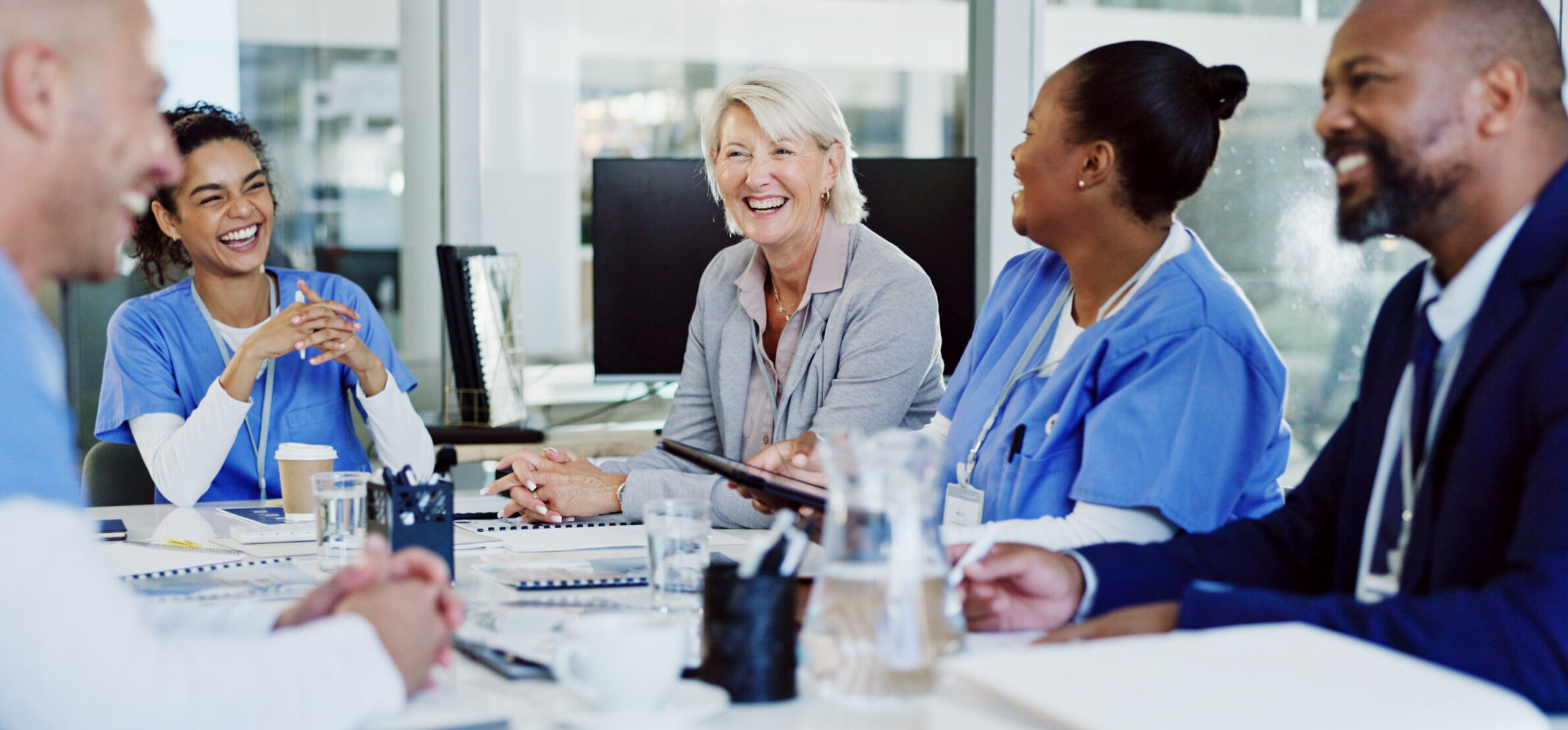 boardroom-collaboration-and-healthcare-with-hospital-manager-speaking-to-staff-for-medical-planning-administration-corporate-and-management-with-professional-talking-to-medicine-team-in-clinic